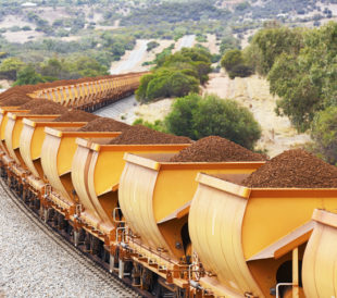 How is the Demand for Iron Ore Related to the Steel Industry?