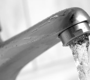 Water running out of a faucet. Image: Gyvafoto/Shutterstock.com