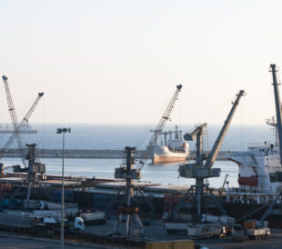 picture of syrian port with ships unloading